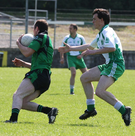 Action from the senior secondary league game against Naomh Bríd.