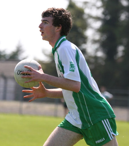 Action from the senior secondary league game against Naomh Bríd.