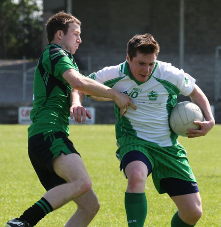 Action from the senior secondary league game against Naomh Bríd.