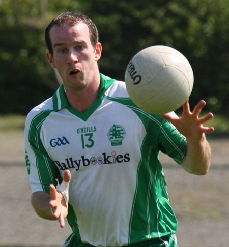 Action from the senior secondary league game against Naomh Bríd.