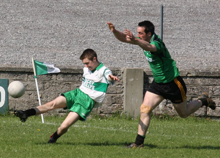 Action from the senior secondary league game against Naomh Bríd.