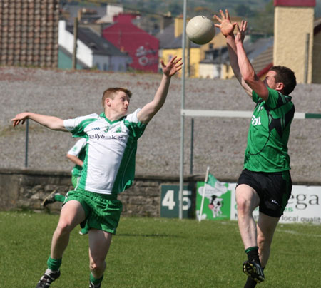 Action from the senior secondary league game against Naomh Bríd.