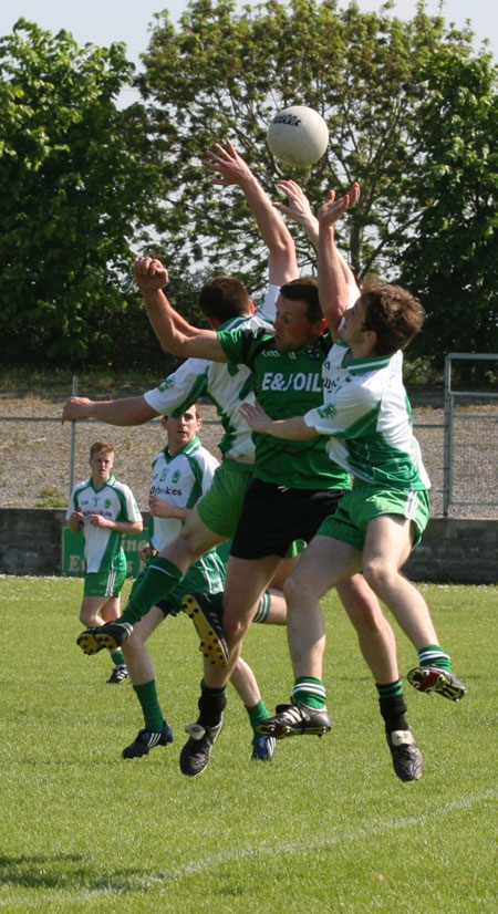 Action from the senior secondary league game against Naomh Bríd.