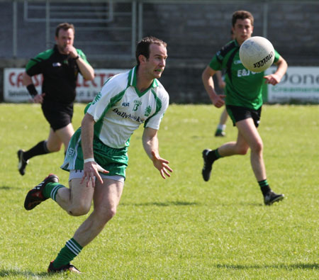 Action from the senior secondary league game against Naomh Bríd.