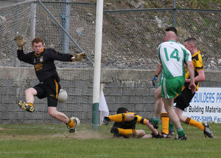 Action from the senior secondary league game against Naomh Brd.