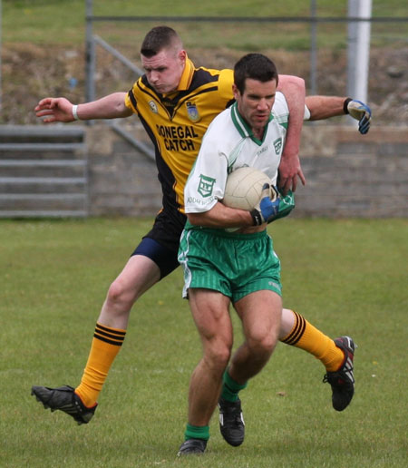 Action from the senior secondary league game against Naomh Brd.