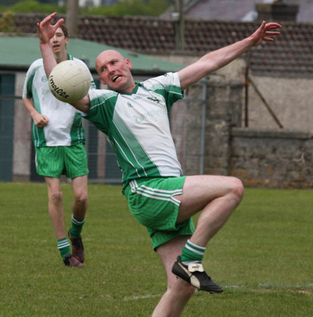 Action from the senior secondary league game against Naomh Brd.