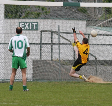 Action from the senior secondary league game against Naomh Brd.