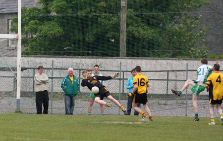 Action from the senior secondary league game against Naomh Brd.