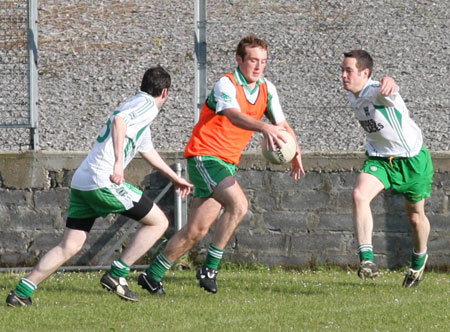 Action from the senior secondary league game against Naomh Brd.