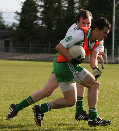 Action from the senior secondary league game against Naomh Brd.