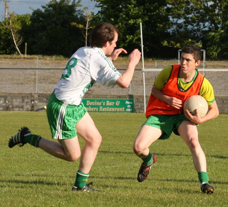 Action from the senior secondary league game against Naomh Brd.