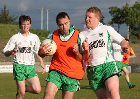 Action from the senior secondary league game against Naomh Brd.