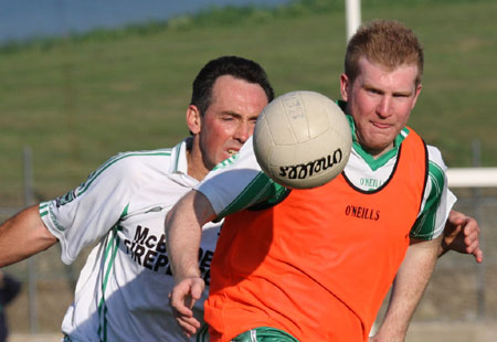 Action from the senior secondary league game against Naomh Brd.