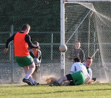 Action from the senior secondary league game against Naomh Brd.