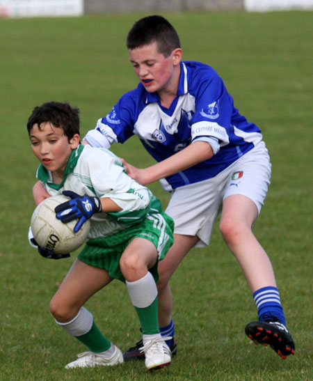 Action from the under 14 league game against Four Masters.