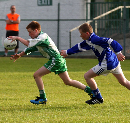 Action from the under 14 league game against Four Masters.