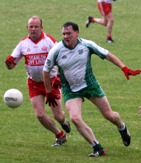 Action from the Junior B championship play-off against Glenfin.