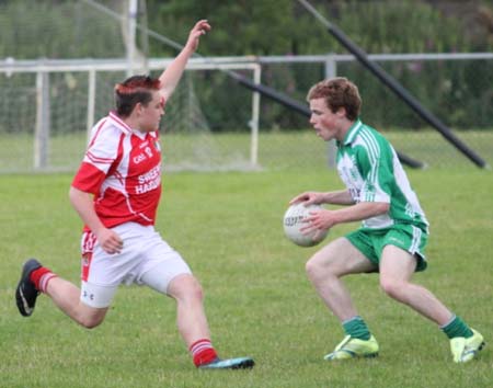 Action from the championship game between Aodh Ruadh and Dungloe.