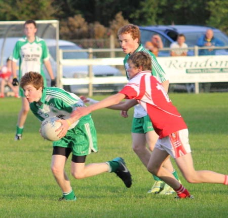 Action from the championship game between Aodh Ruadh and Dungloe.