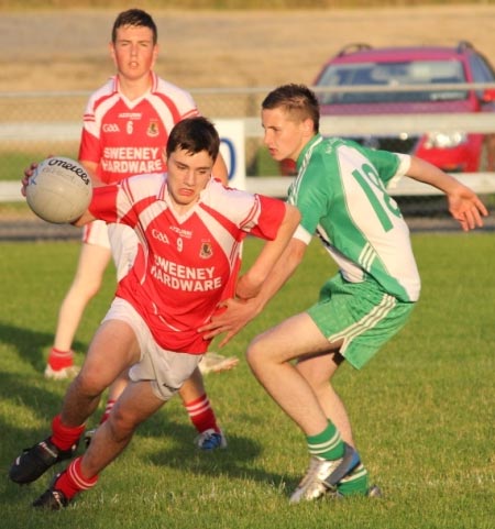 Action from the championship game between Aodh Ruadh and Dungloe.