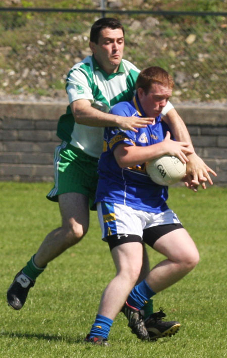 Action from the senior reserve division two match against Kilcar.