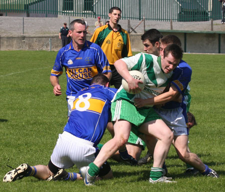 Action from the senior reserve division two match against Kilcar.