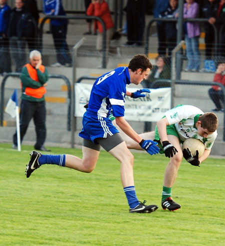 Action from the minor championship first round between Aodh Ruadh and Four Masters.