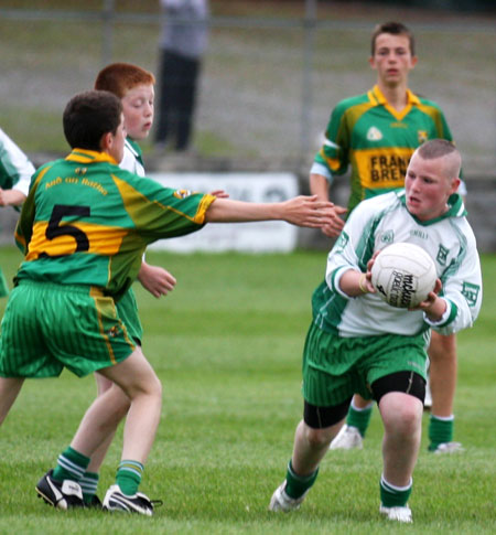 Action from the minor championship quarter-final between Aodh Ruadh and Four Masters.