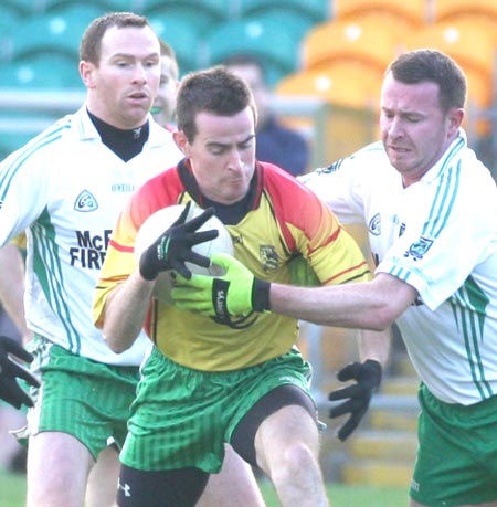 Action from the senior  division two match against MacCumhaill's.