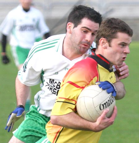 Action from the senior  division two match against MacCumhaill's.