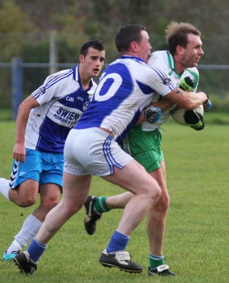 Action from the senior  division two match against MacCumhaill's.