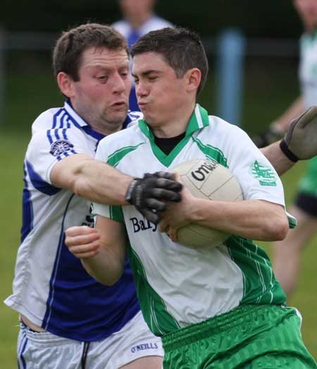 Action from the senior  division two match against MacCumhaill's.