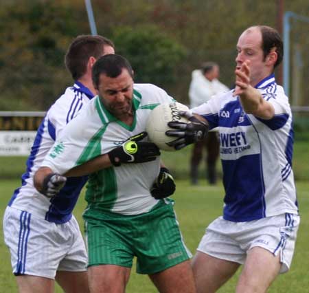 Action from the senior  division two match against MacCumhaill's.