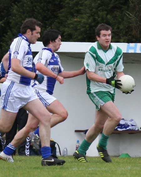 Action from the senior  division two match against MacCumhaill's.