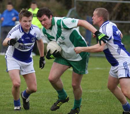 Action from the senior  division two match against MacCumhaill's.