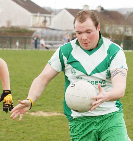 Action from the reserve senior division three match against Naomh Bríd.