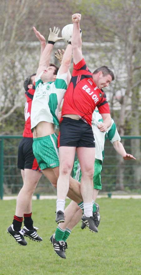 Action from the reserve senior division three match against Naomh Bríd.