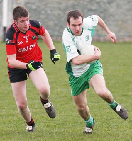 Action from the reserve senior division three match against Naomh Bríd.