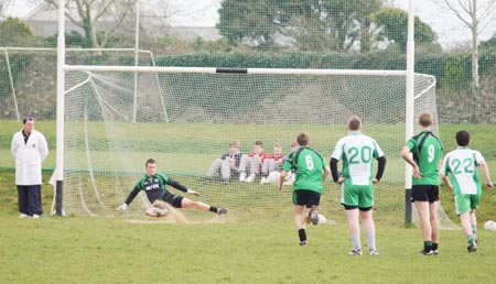 Action from the reserve senior division three match against Naomh Bríd.
