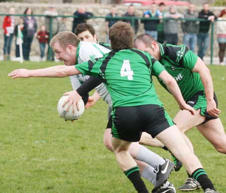 Action from the reserve senior division three match against Naomh Bríd.