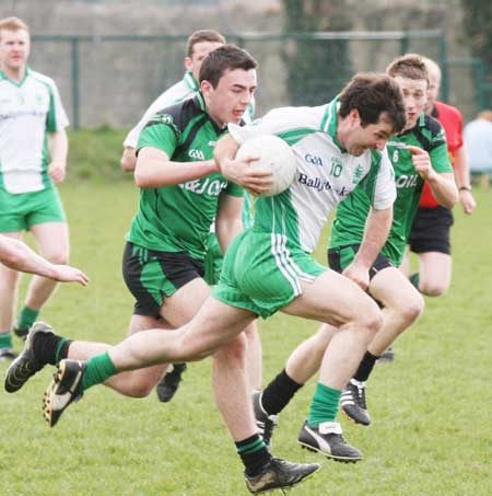 Action from the reserve senior division three match against Naomh Bríd.