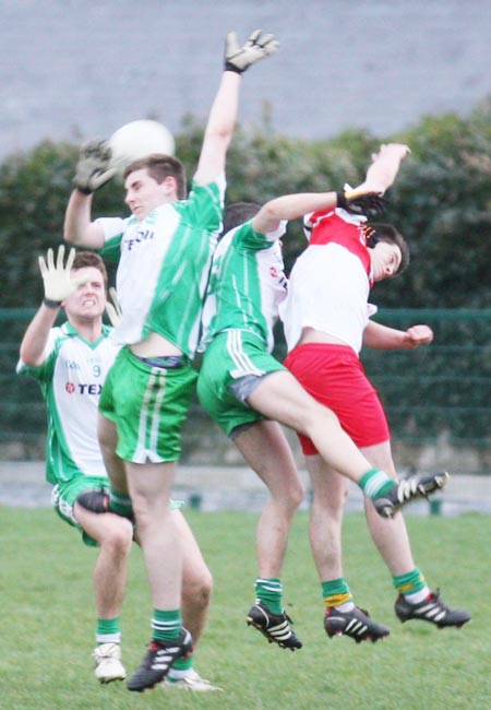 Action from the minor league clash between Aodh Ruadh and Saint John's.