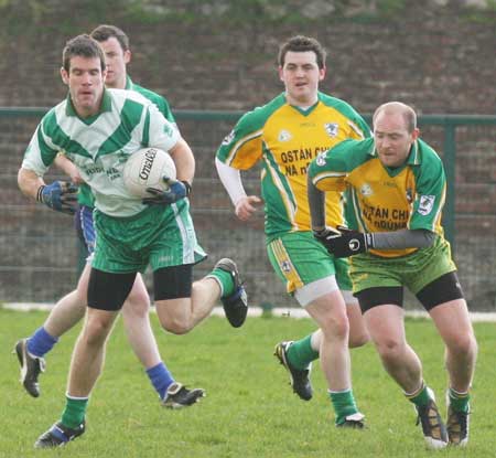 Action from the reserve senior division three match against Downings.