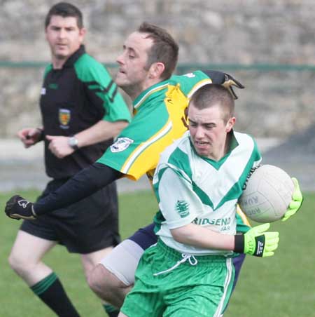 Action from the reserve senior division three match against Downings.