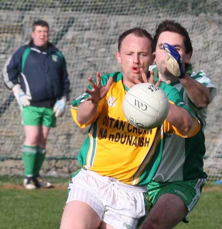 Action from the reserve senior division three match against Downings.