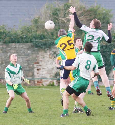 Action from the reserve senior division three match against Downings.