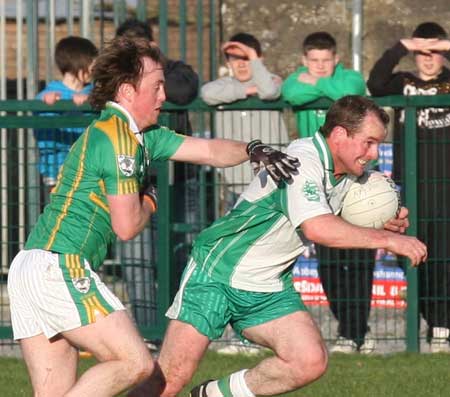 Action from the senior division three match against Downings.