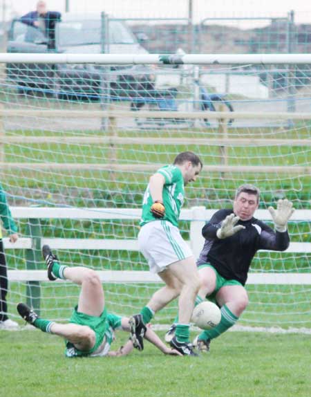 Action from the senior division three match against Naomh Mhuire.