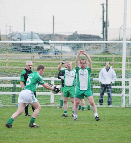 Action from the senior division three match against Naomh Mhuire.